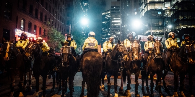 police at protest on horses